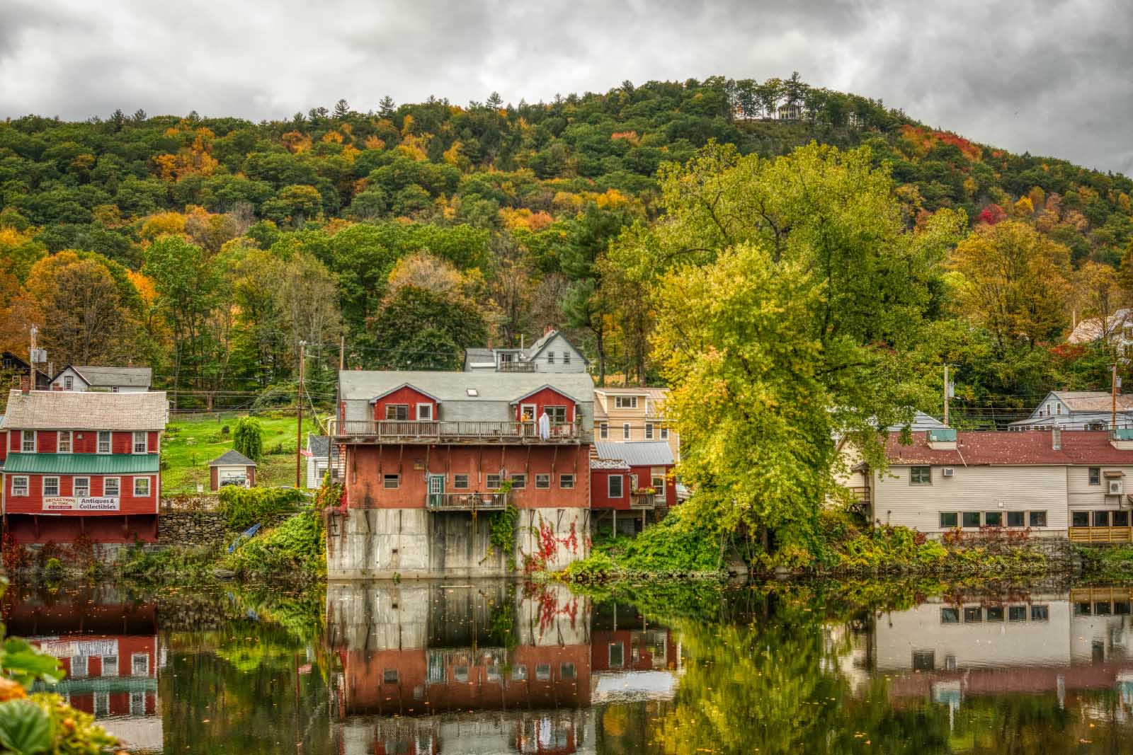 View of a small town with a lake in front of it